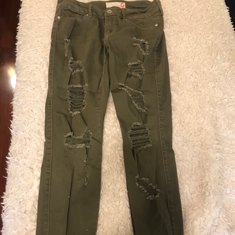 Ripped green skinny jeans